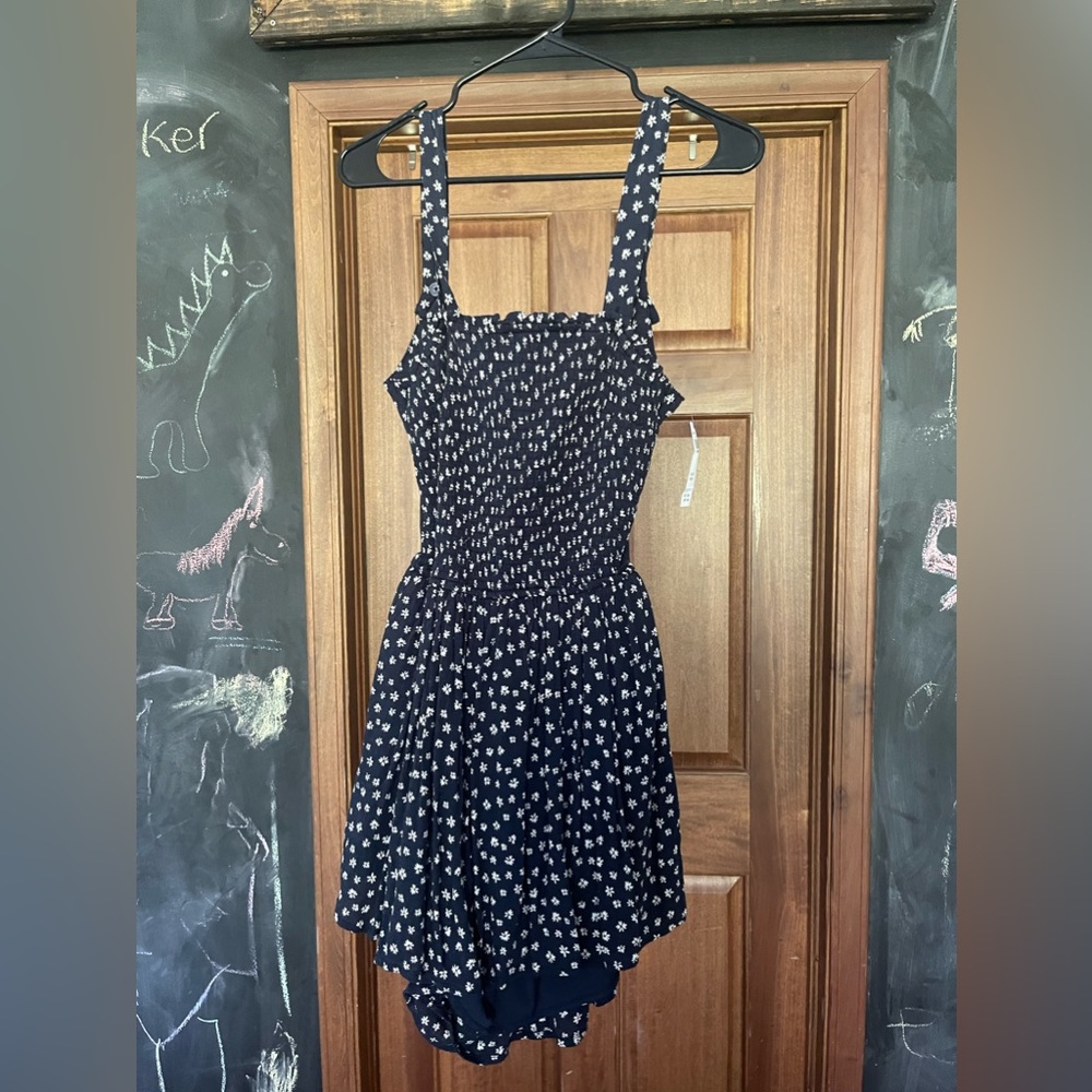 Smocked floral romper, open back